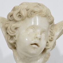 Carved white marble winged angel head, Spain circa 1750