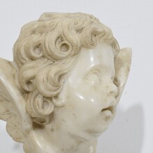 Carved white marble winged angel head, Spain circa 1750