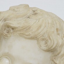 Carved white marble winged angel head, Spain circa 1750